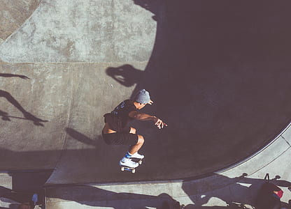 man skating at daytime thumbnail
