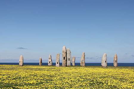 gray stone formation under sunny sky thumbnail