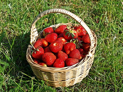 red strawberries in beige wicker basket thumbnail