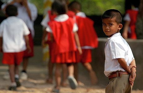 boy wearing white collared shirt and brown bottoms outfit thumbnail