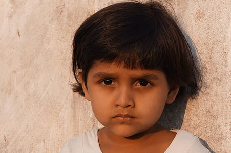 woman leaning against wall thumbnail