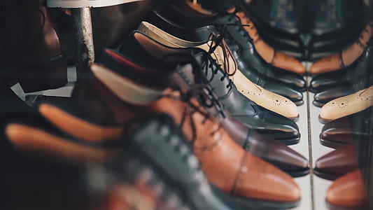 assorted unpaired leather shoes thumbnail