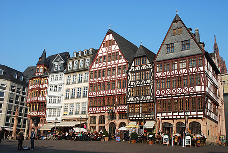 group of people standing near building thumbnail