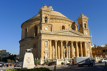low-angle photography of brown dome cathedral thumbnail