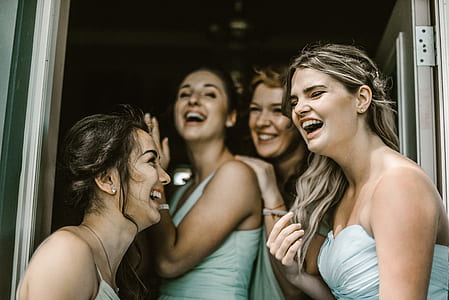 group of women standing at the door thumbnail