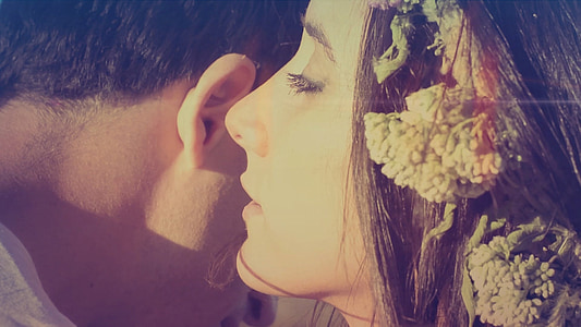 woman near man's ear thumbnail