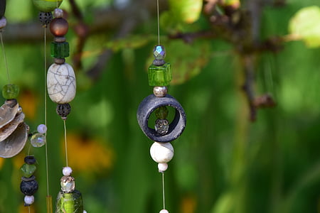gray and white hanging decor close-up photo thumbnail