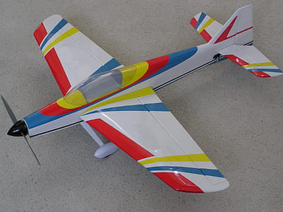 white and multicolored aircraft toy thumbnail