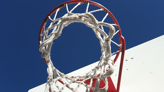 high-angle photography of red and white basketball hoop thumbnail