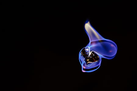 blue flame on brown stone thumbnail