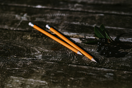 Small flowers, pencils and other things on wood thumbnail