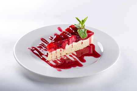 sliced cake on white ceramic plate thumbnail