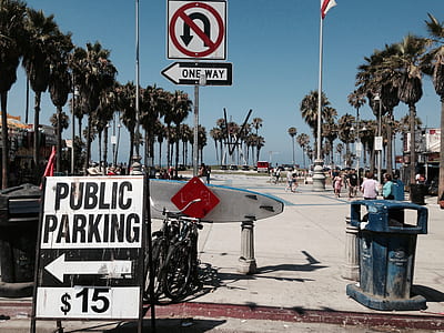 white and black Public Parking $15 sign thumbnail