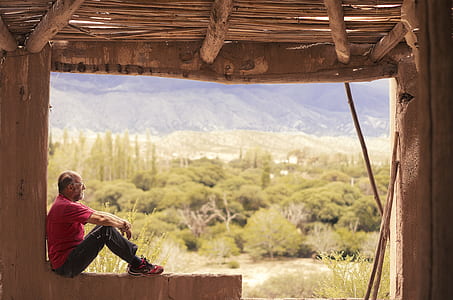 man sitting on bench thumbnail