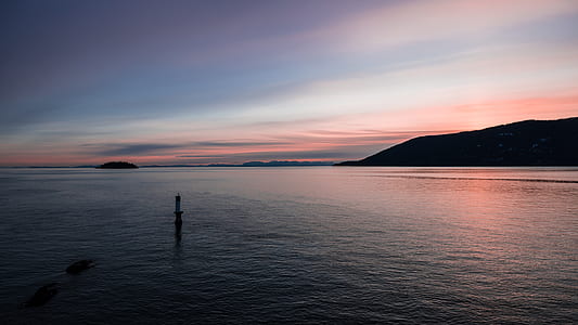 silhouette photo of person at beach thumbnail