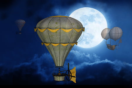 three grey hot air balloons floating during nighttime thumbnail