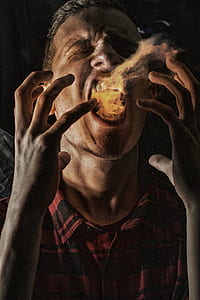 man blowing fire thumbnail