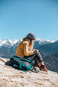 woman sketching mountains thumbnail
