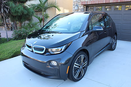 black BMW 3-door hatchback near garage door thumbnail