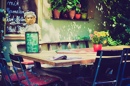 green chalkboard on brown table thumbnail
