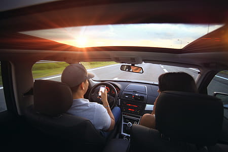 Man Using Smartphone While Driving thumbnail