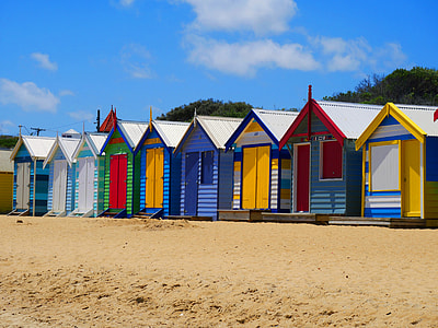 blue, red, and yellow wooden houses thumbnail