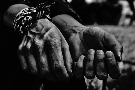 grayscale photo uf guman hands thumbnail