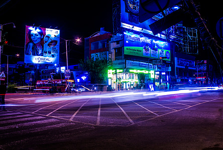 time lapse photography of cars on road thumbnail