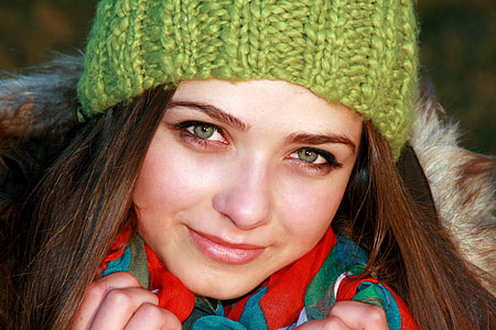 woman wearing green knitted cap thumbnail