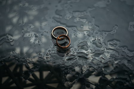 silver-and-gold-colored rings thumbnail