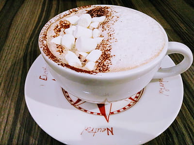 Photo of White and Brown Frappe on Ceramic Tea Cup thumbnail