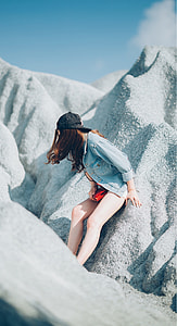 selective focus of woman leaning on sand thumbnail