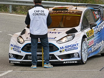 white Ford Focus RS on track near man standing thumbnail