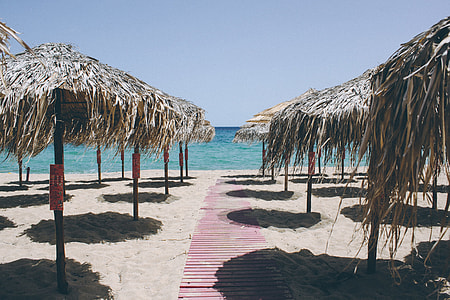Thatched beach umbrellas thumbnail