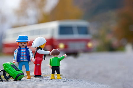 miniature action figures on road thumbnail