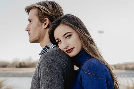 woman's head on man's shoulder thumbnail