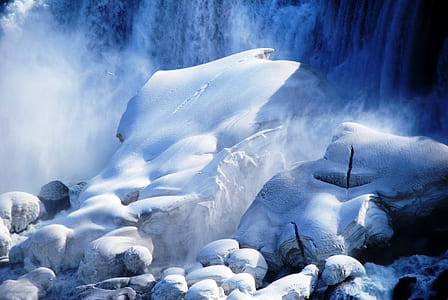 snow formation near waterfalls thumbnail