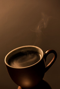 black coffee filled brown ceramic mug thumbnail