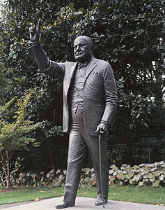man holding cane statue thumbnail