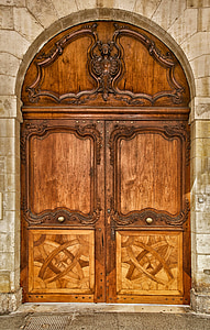 closed brown wooden arch door thumbnail