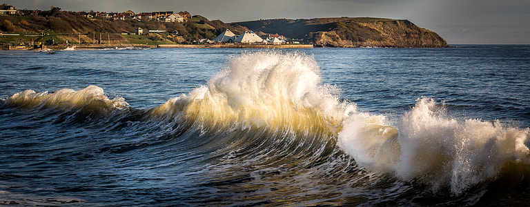 ocean wave during daytime thumbnail