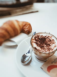 Selective Focus Photo of a Cup Filled With Coffee on White Ceramic Saucer thumbnail