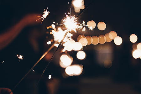bokeh photography of sparkler cracker thumbnail