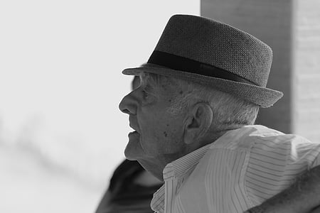 man wearing brown fedora hat thumbnail