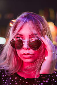 Young Fashionable Woman In Sunglasses Photo thumbnail