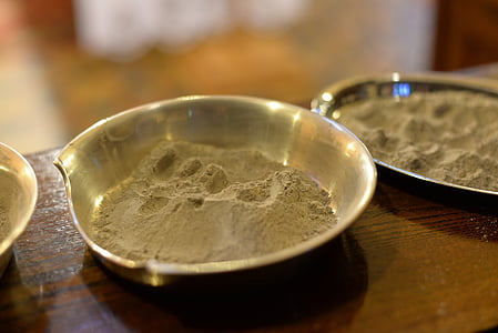 sand in stainless steel bowl thumbnail
