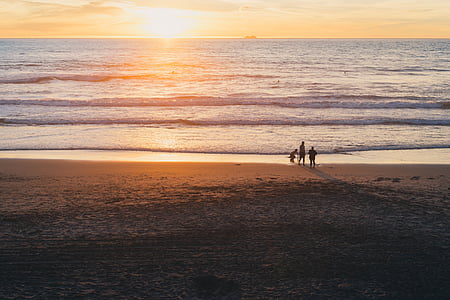 two person standing on beachside thumbnail