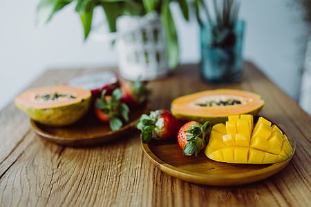 Exotic fruits on a wooden table thumbnail