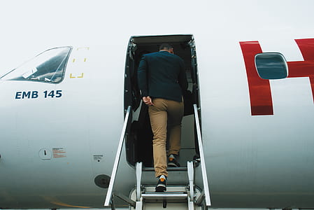 man in red and white airliner thumbnail