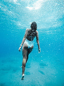 underwater photography of woman thumbnail